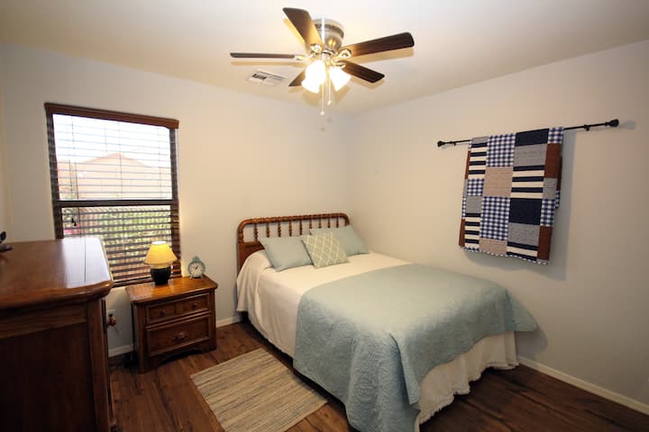 Bedroom #3 is located down the hall with more privacy and bathroom #3 is located right next to it.  It has a Queen size bed, ceiling fan and large closet with extra pillows and blankets.