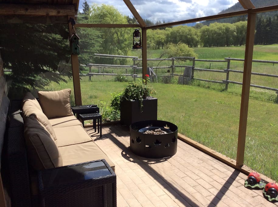 Heritage Cabin front patio with stunning views of the country side. This is a great place to sit and relax.