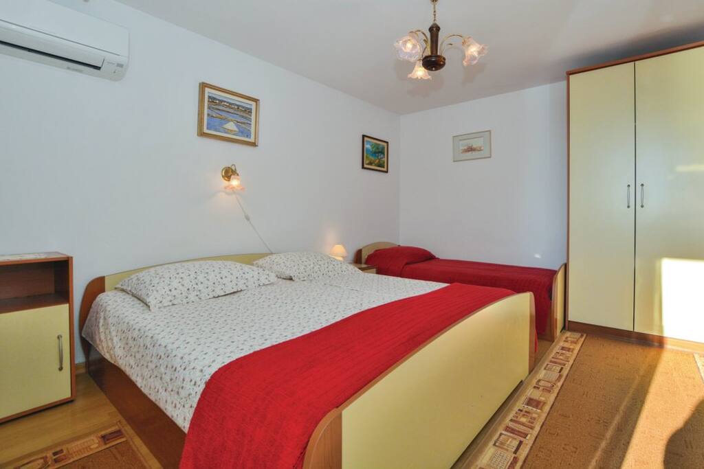 Bedroom with a double bed and single bed