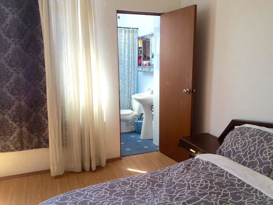Attached private bathroom.