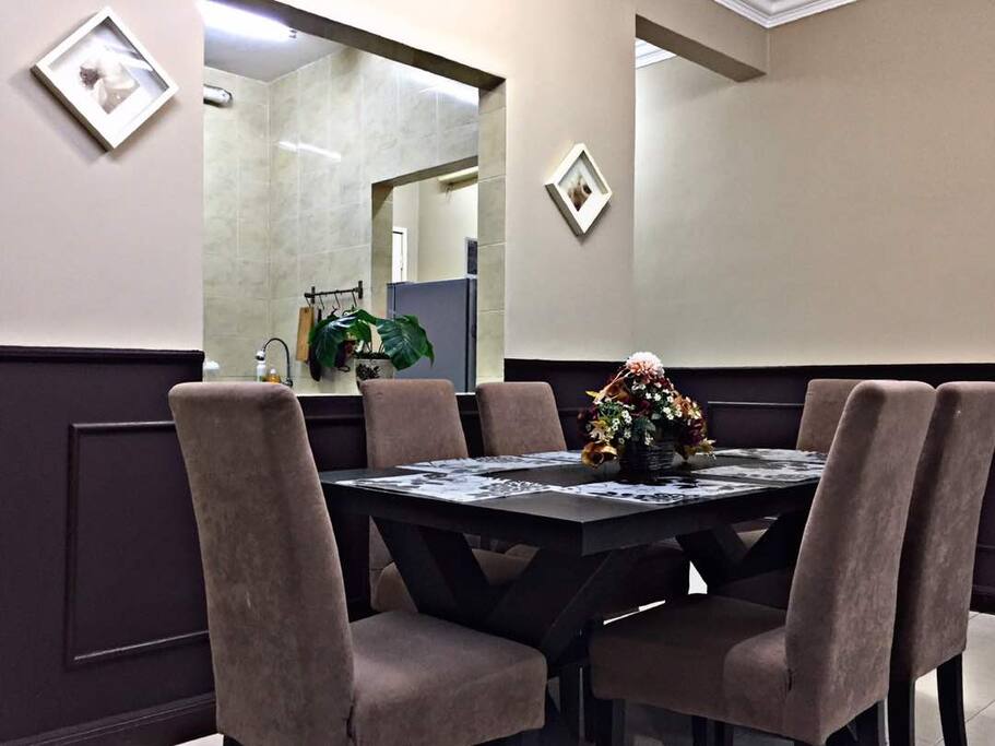 Dining area complimented with 6-seater dining table.