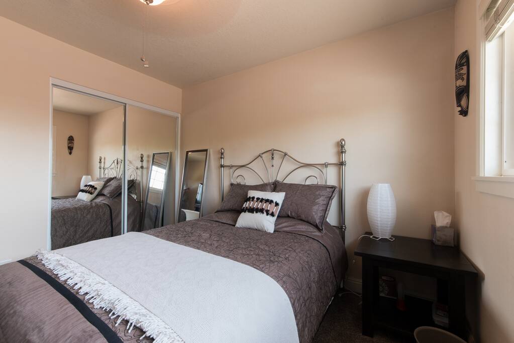 Newly remodeled room with sliding mirror door