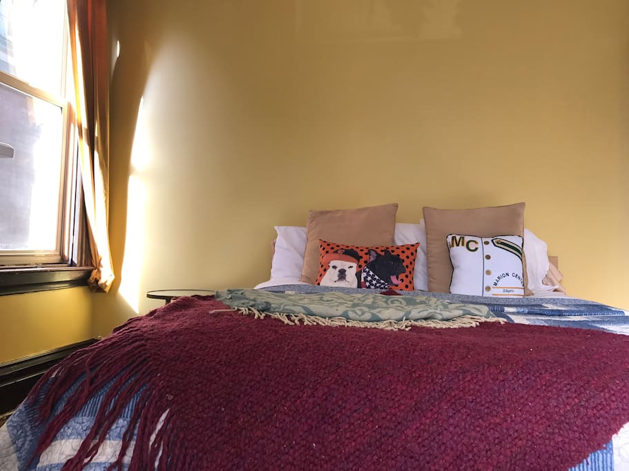 Our guest room is also the sunniest (three windows!) and largest room.