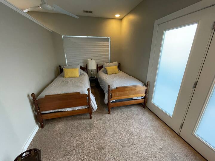 Two twin beds in the second bedroom. 