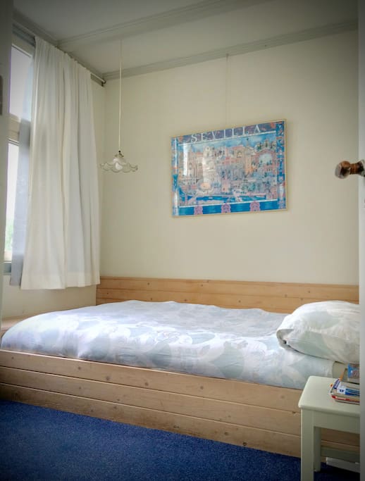 A cosy, peaceful, very relaxing room with a double bed (with added facility of under bead heating for an even comfier experience). Sheets are changed every third day, or more often upon request. Additional blankets and extra pillows at your service.