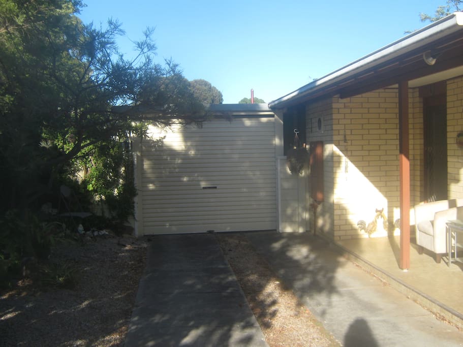 undercover , secure parking with electric roller door