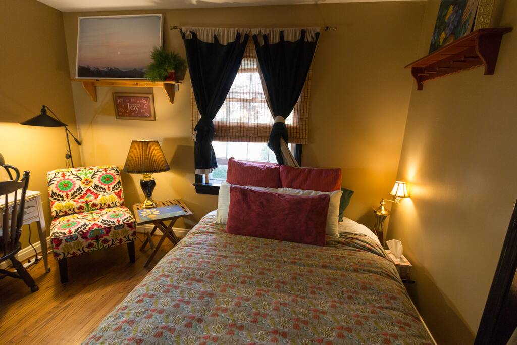 Queen sized bed with warm winter down comforter in duvet