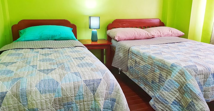 DORMITORIO 1 (cama doble y cama individual) Y AIRE ACONDICIONADO DIVIDIDO.