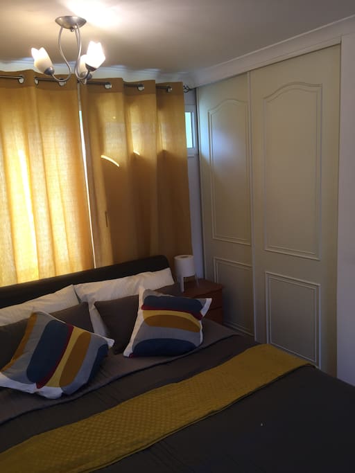 King size bed and built-in wardrobe