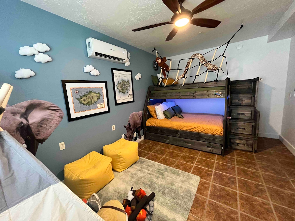  Guest Room 4 Jumanji Jungle | 2 Twin bed 1 Full bed | read or play in the tent under the fairy lights, play Pac-Man, use your imagination to explore jumanji 