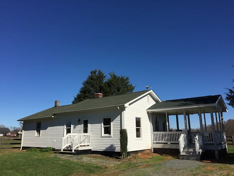Milker's Cottage at Wolftrap Farm (Horses in back)