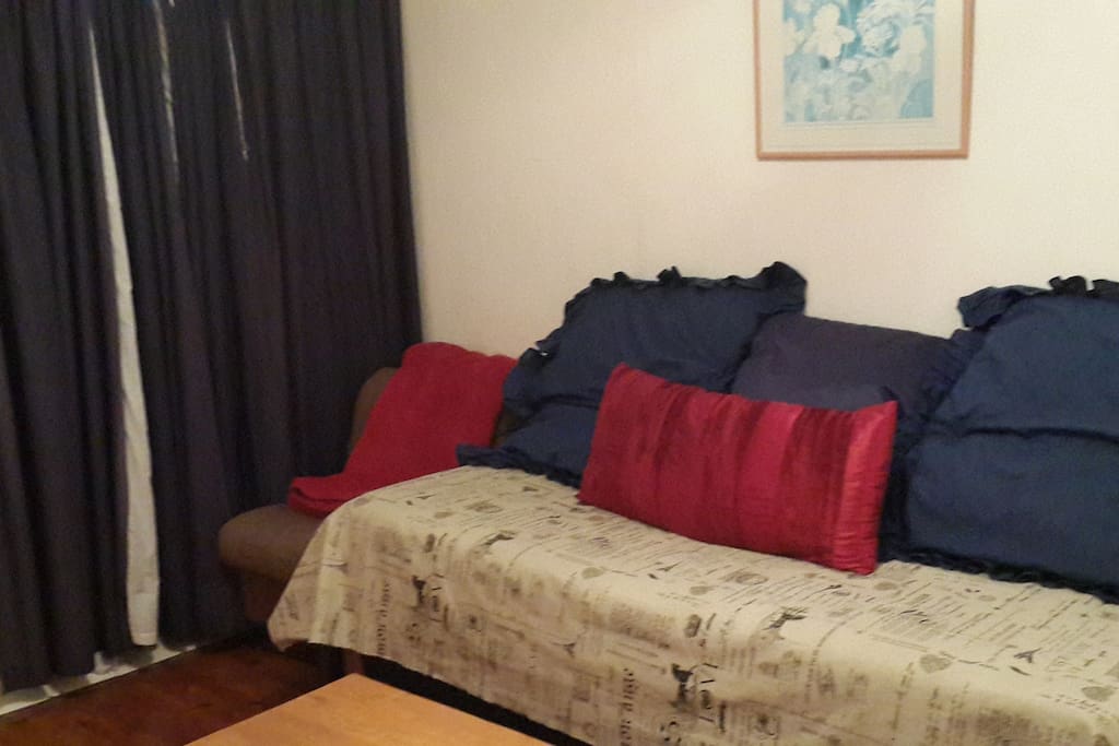 Downstairs bedsitter with single bed giving more space.