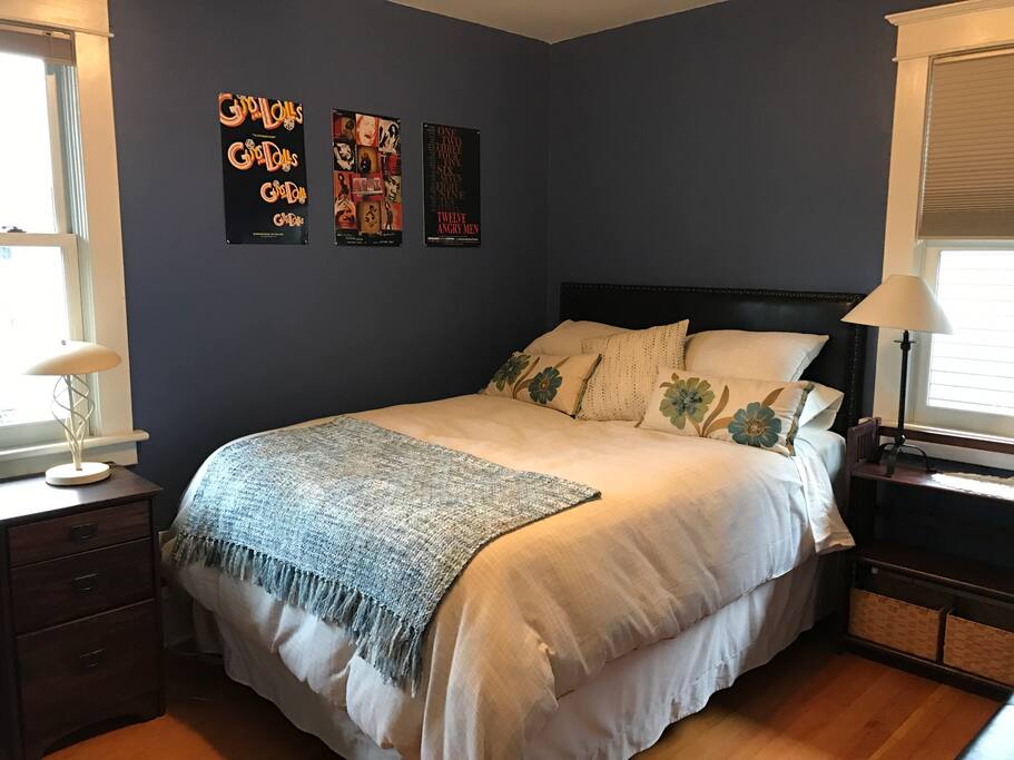 This is bedroom #2, the blue room. It has a queen bed with a memory foam topper and quality linens.