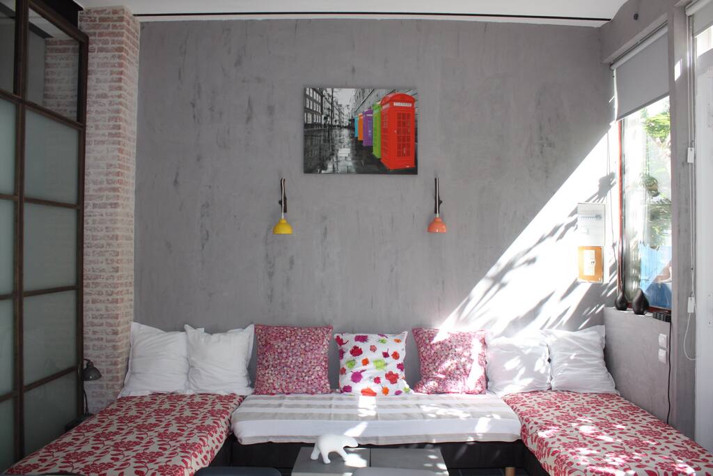 Coin salon avec banquettes convertibles 90x200