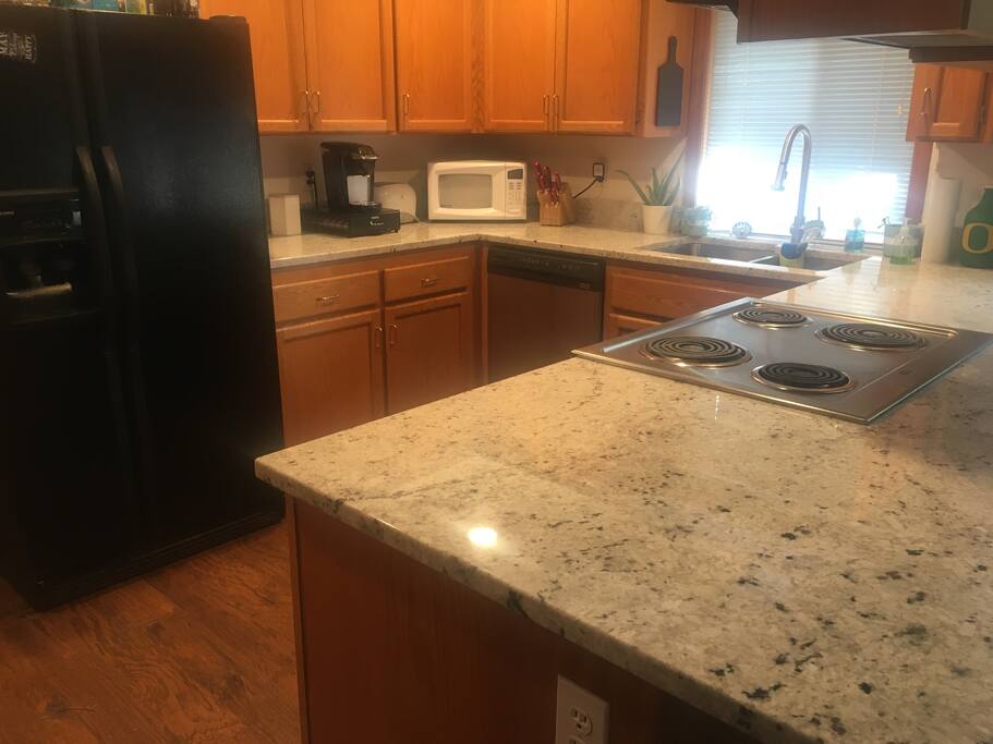 Kitchen with eat in bar top