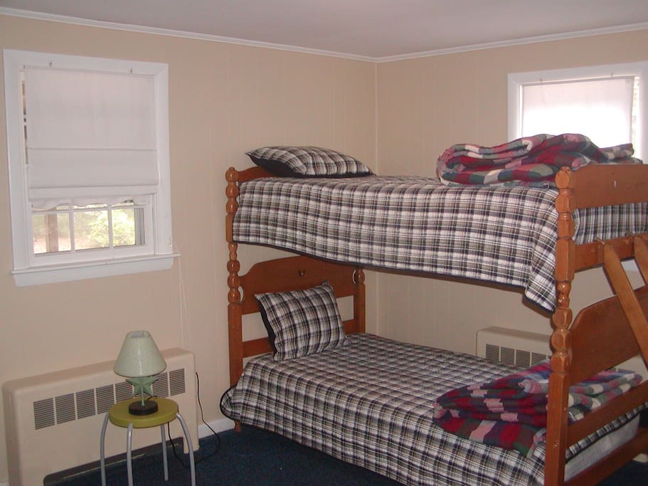 Second bedroom is extra large and features bunks plus twin