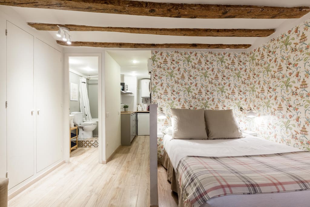 The bed is separated with a little wall