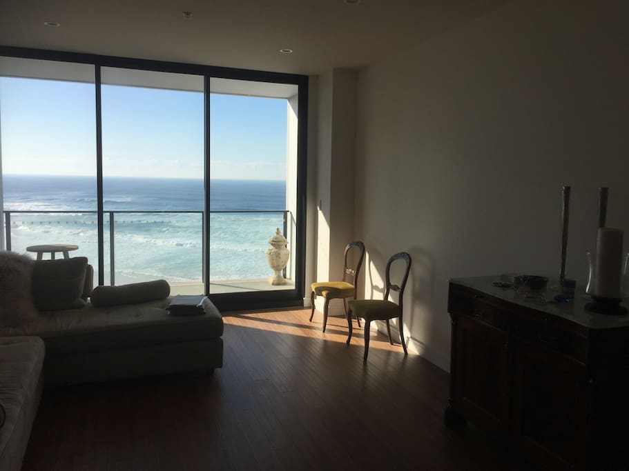Living area to stacker glass doors and balcony