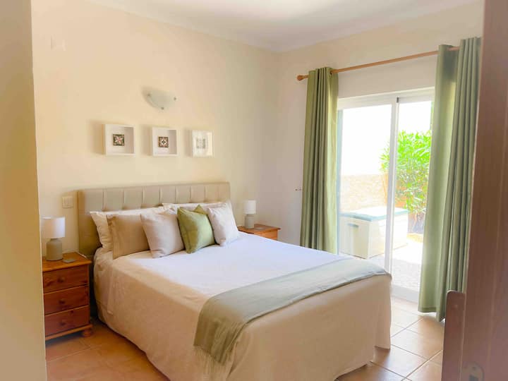 Second double occupancy room with courtyard access to backyard. Queen sized bed