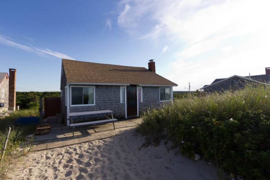 view of cottage from the beach