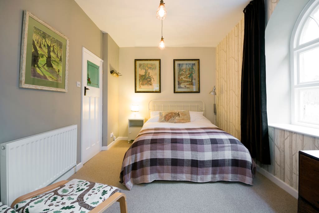 Woodland retro room with original paintings.