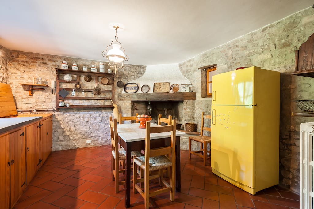 THE KITCHEN WITH FIREPLACE