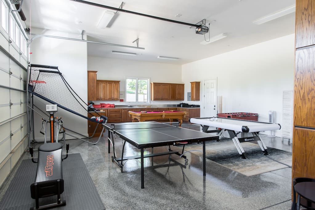 Kids will appreciate that the converted garage has a giant game room.