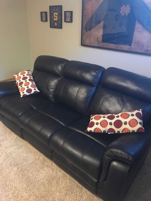 Couch in living area suitable for sleeping