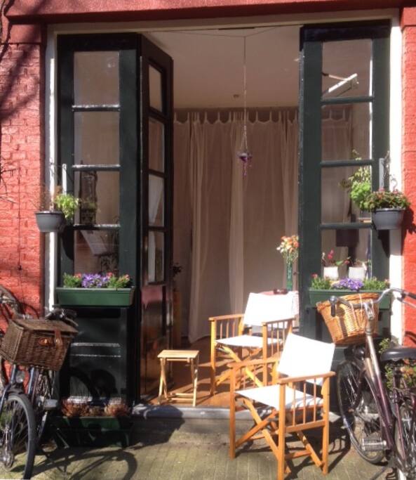 The apartment opens out directly onto the canal