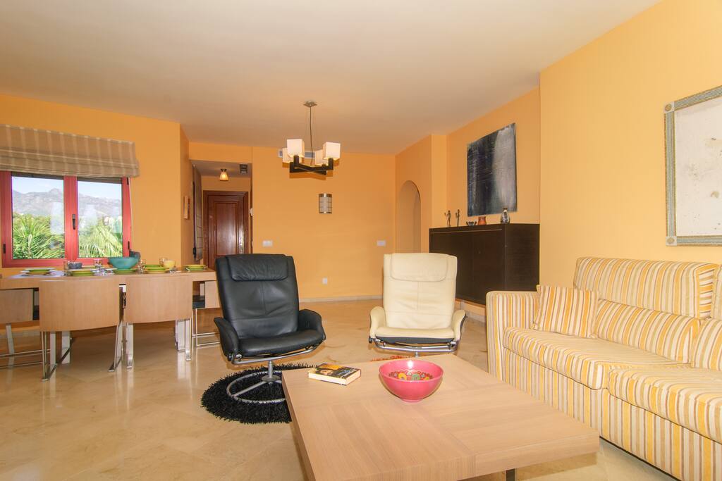 Coffee table with sofa and armchairs
