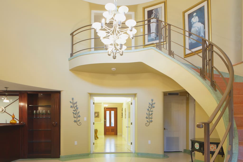 Elegant staircase to rooms, original built in 1949 mid-century modern style.