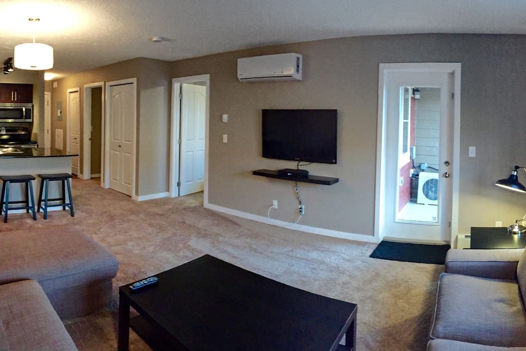 Open concept living with patio.