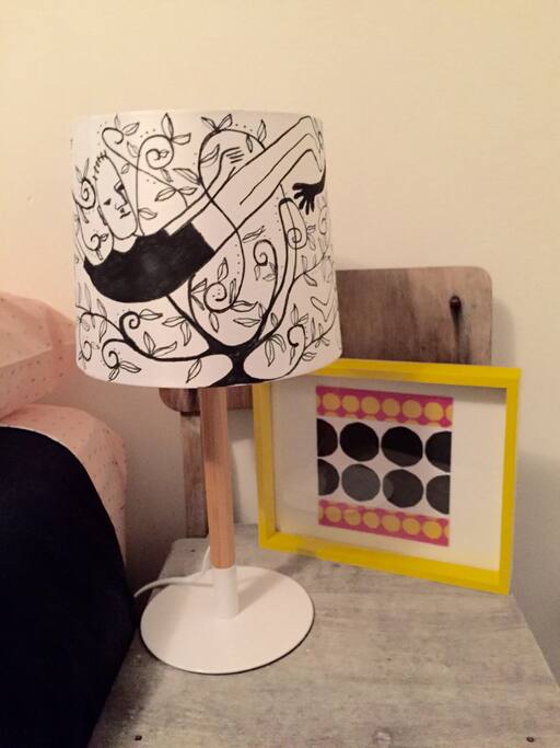 Hand painted lamp shade in bedroom