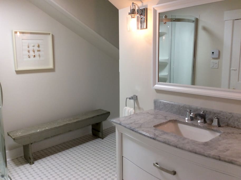 The Turquoise Room and Grey Room share a beautiful bathroom