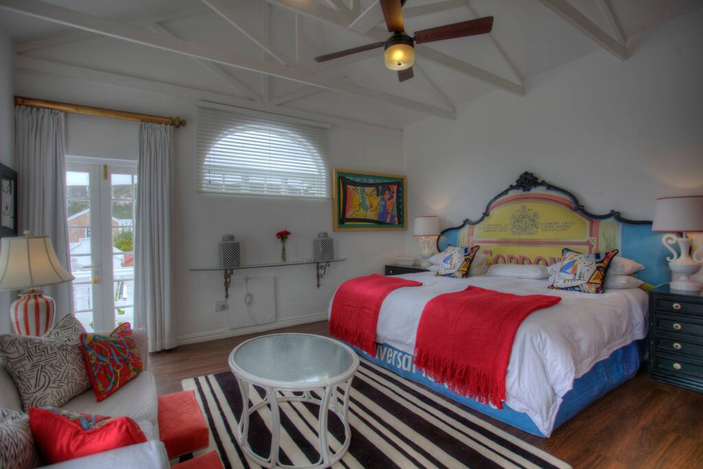 Super sized king size bedroom with en suite and balconies overlooking pool