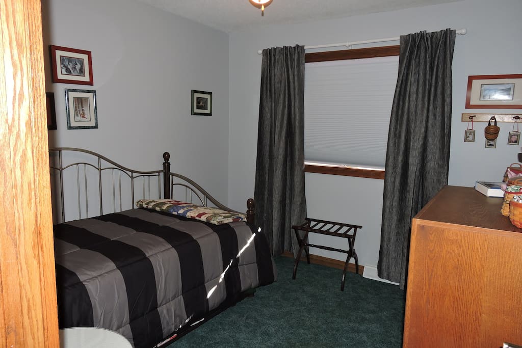 New paint and drapes with pull down blind.