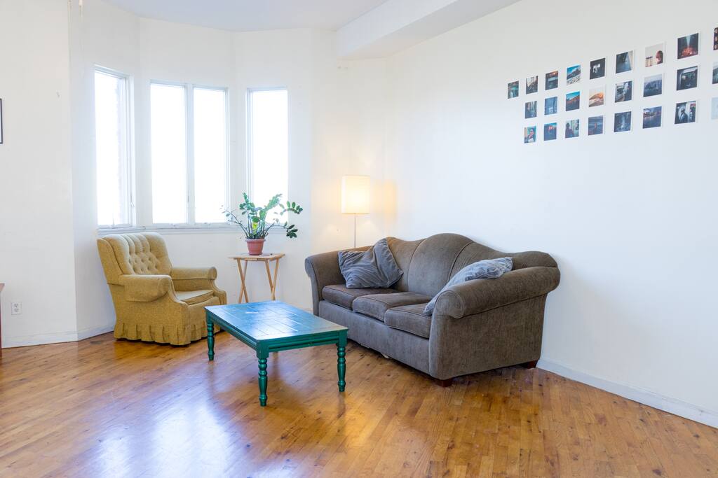 Well lit, large living room (with a view of the Empire State Building!).