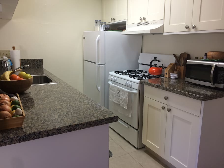 Kitchen is stocked and equipped with all the essentials for guest use.