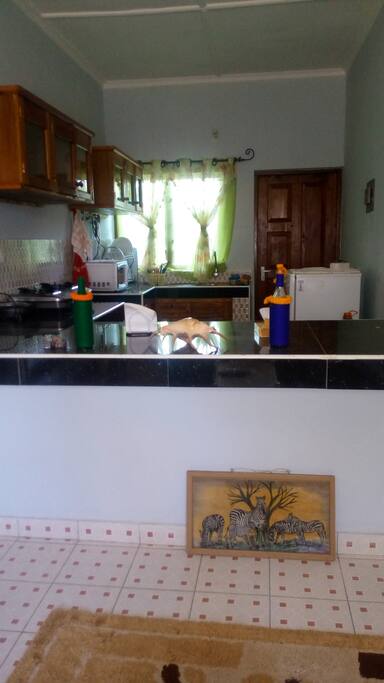 The kitchen where smiles emanate from the smell of boiling pots.