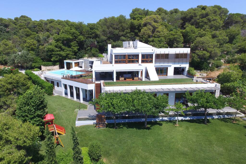 The villa on a wooded mountain side, with a beautiful forest