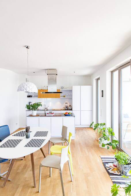 Spacious kitchen with easy access to terrace. Equipped with dishwasher, full fridge and separate freezer.