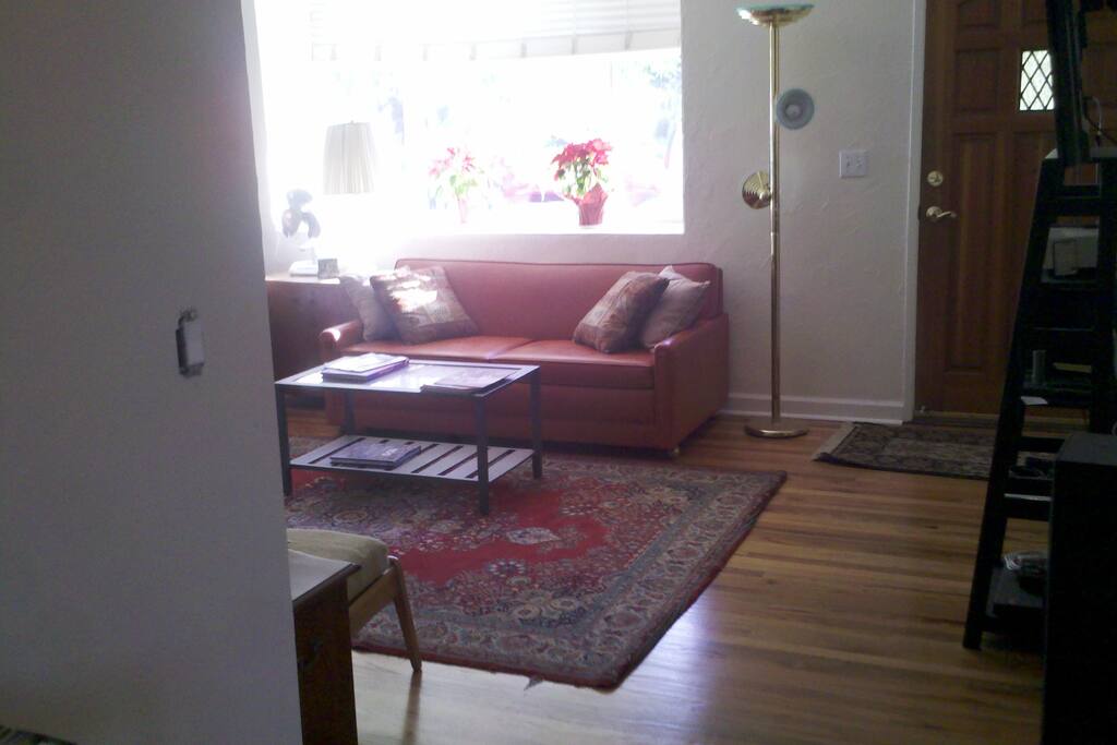 Comfortable living area can be used as workspace.