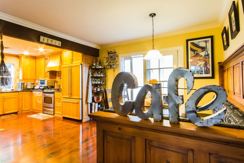 Dining nook seats 6, large kitchen w all amenities, door to gated side yard.
