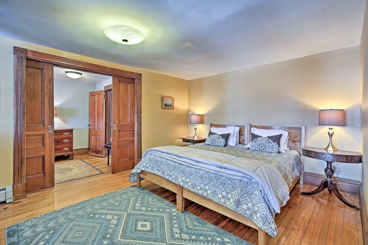 Master bedroom, original pocket doors, hand made bed, hardwood floors