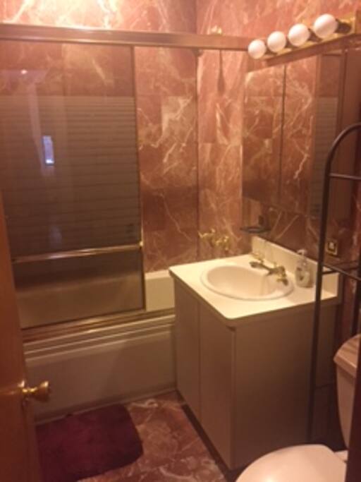 Spacious bathroom with full tub