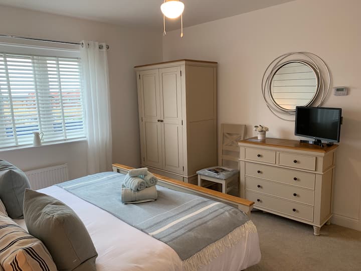 Chumba cha kulala cha kiwango cha juu kilicho na chumba cha kulala 