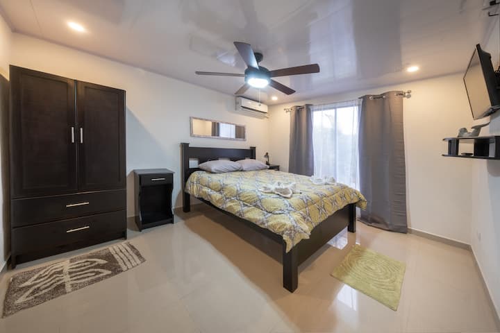 Master Suite #2 with AC, Private Bathroom and TV. 