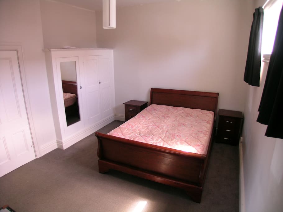Large Double Bedroom with generous wardrobe.
