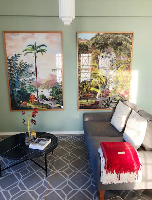The living room with its botanical theme