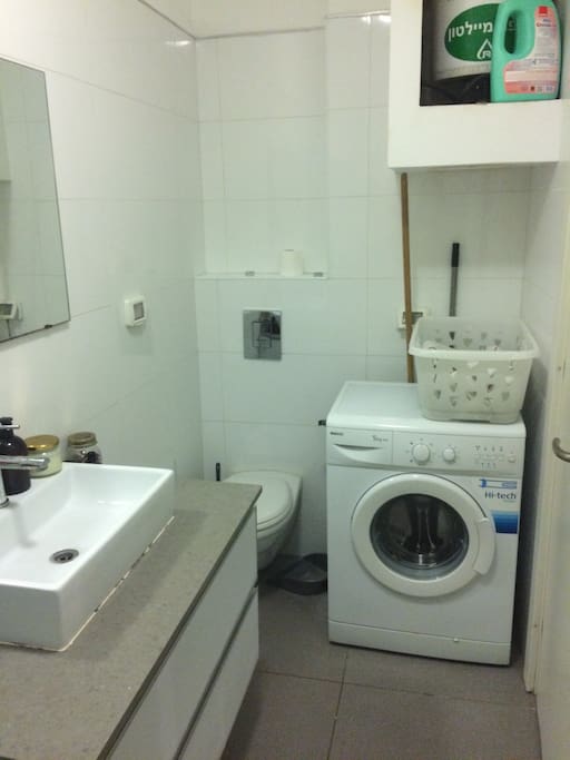 Large basin sink, loads of counter space, and a washer for the guests to use.